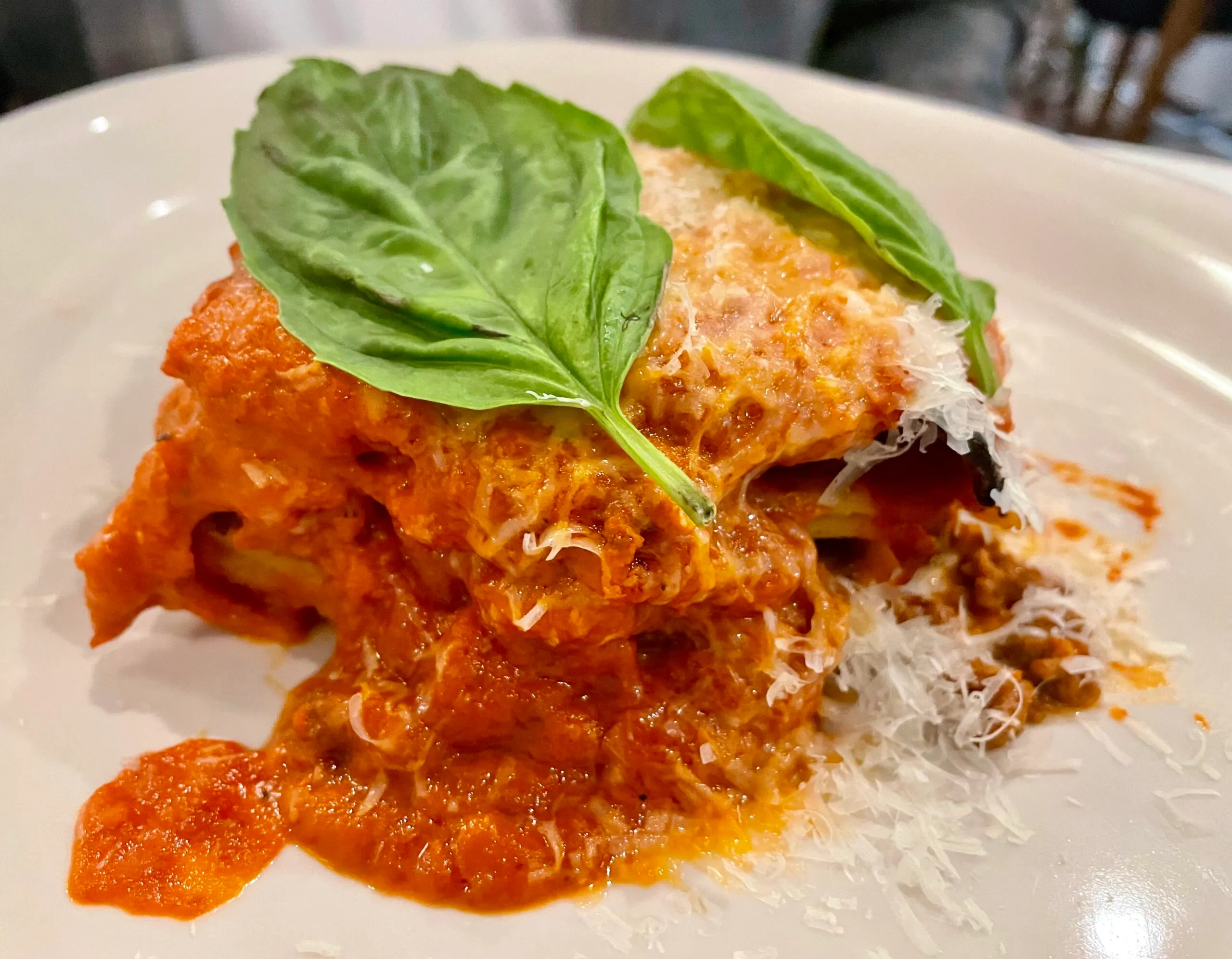 Margie’s Italian Gardens signature dishes Lasagna, Spaghetti with Meatballs, Chicken Parmesan, various pizzas.